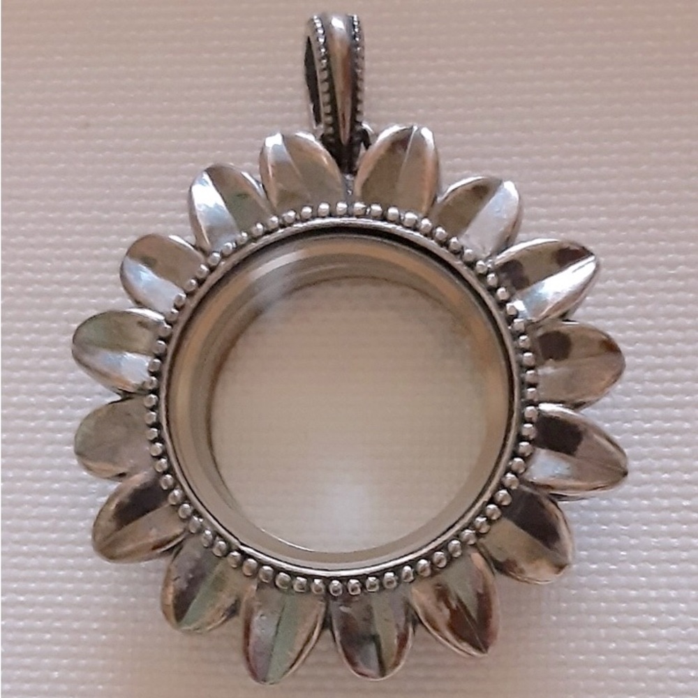Never worn, boxed, Origami Owl Sunflower classic hinged Locket.